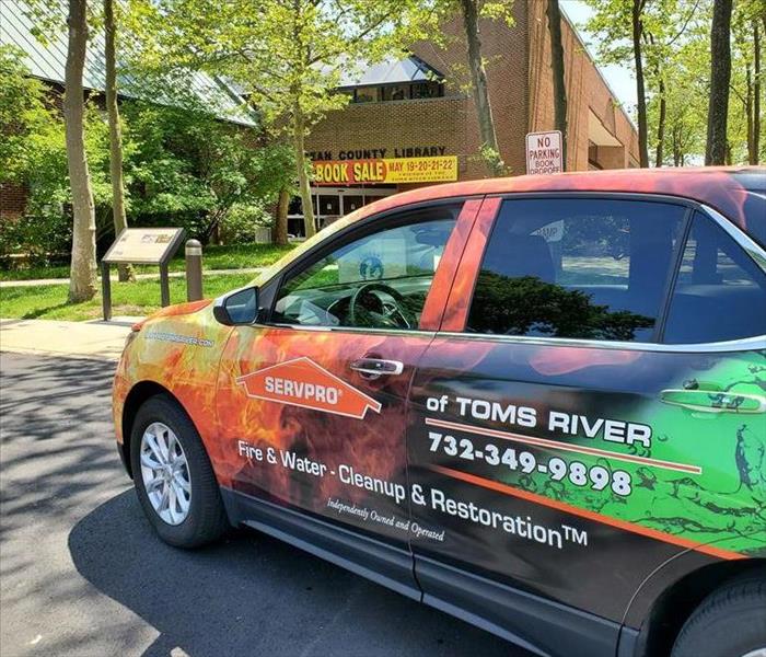 banner hanging above the entrance of the Ocean County Library Toms River donated by SERVPRO of Toms River