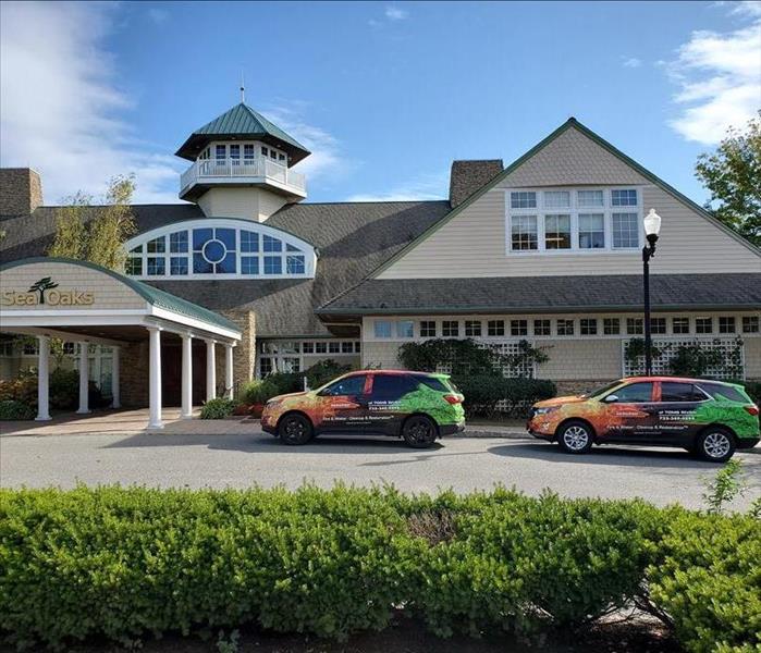 2 new SERVPRO of Toms River vehicles parked outside the Sea Oaks Country Club in Little Egg Harbor