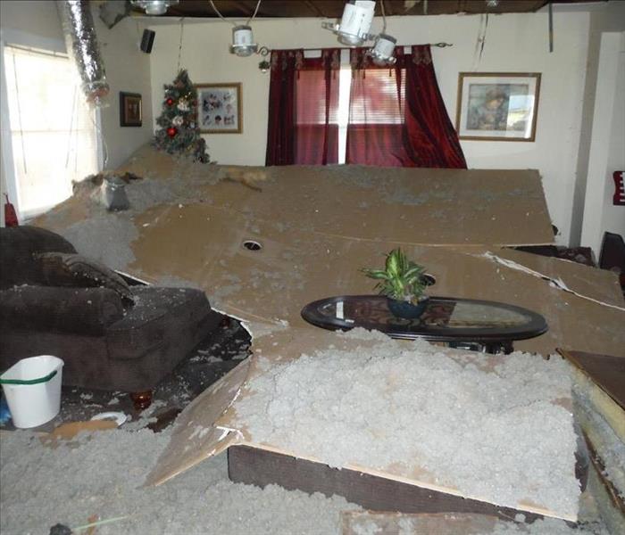 drywall and insulation covering a living room floor