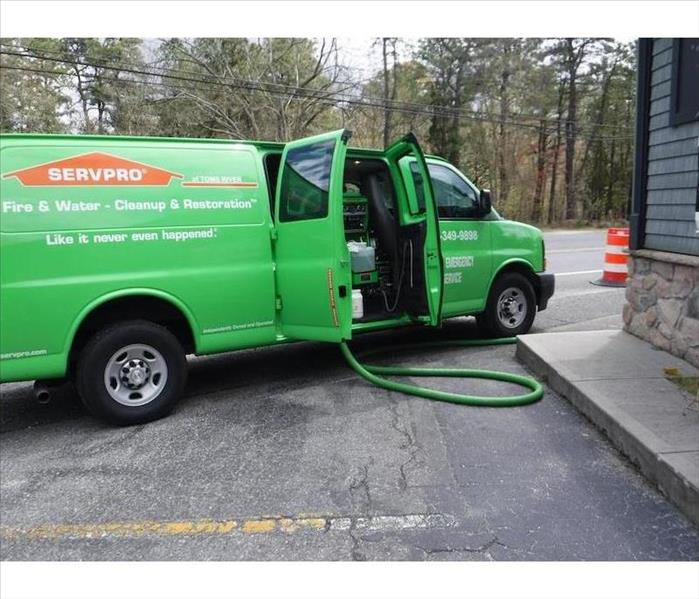 SERVPRO van with restoration services equipment