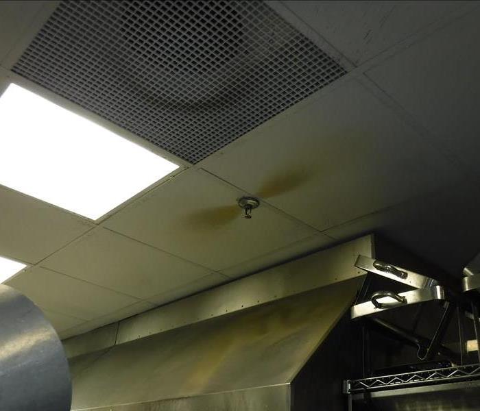 Ceiling with fire damage of commercial building 