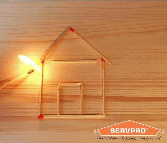 House made out of matchsticks getting set on fire