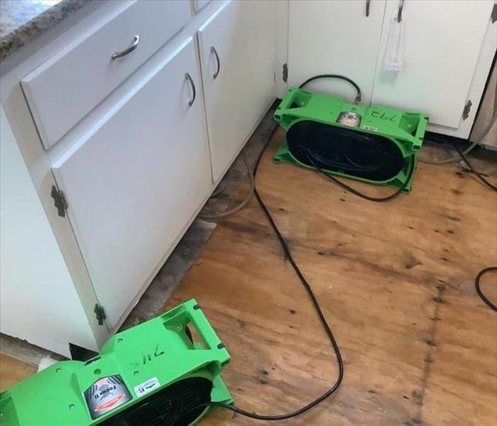 SERVPRO of Toms River drying equipment in the kitchen from a water damage
